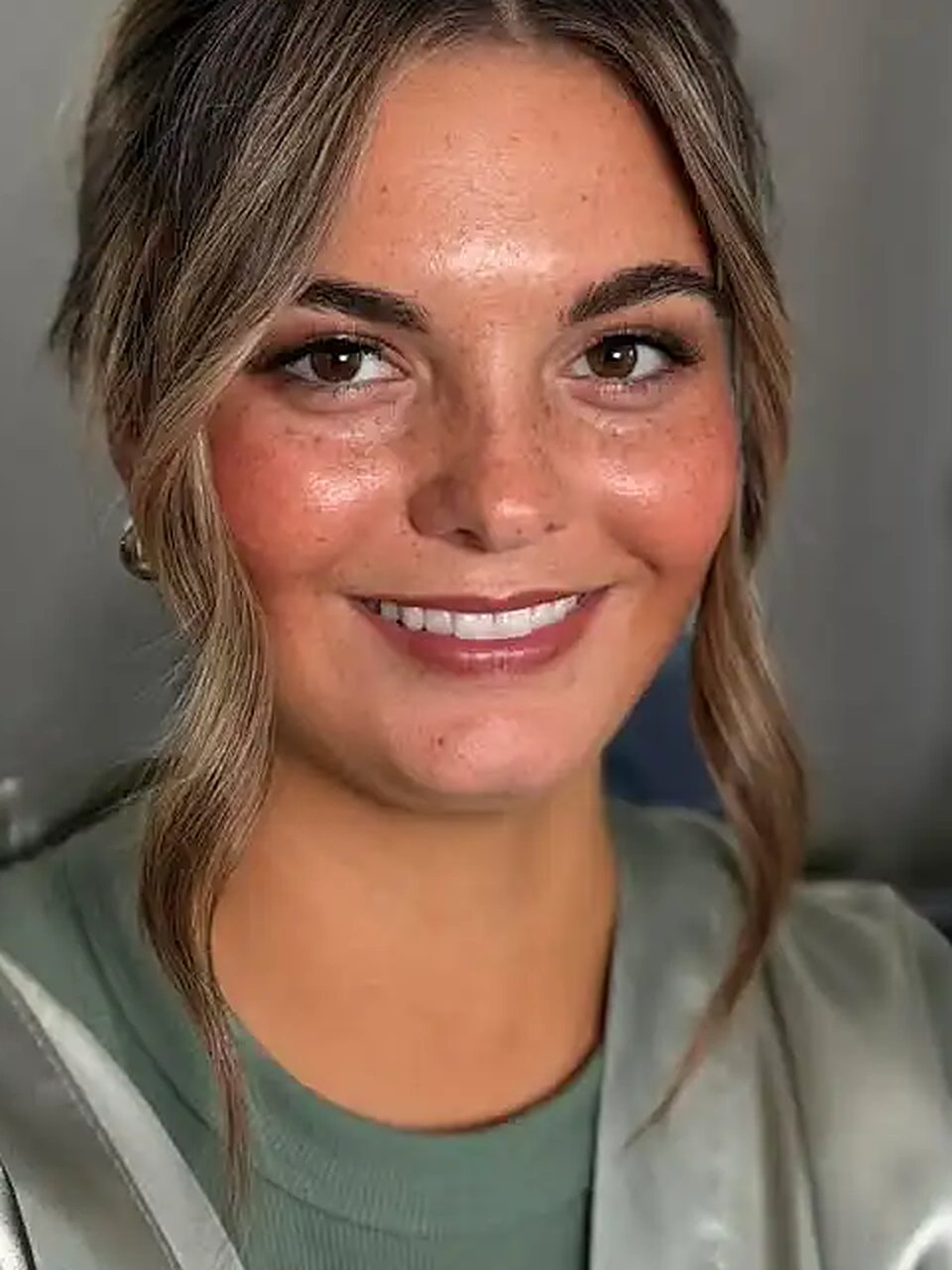 Close-up of a client's warm, sun-kissed glow