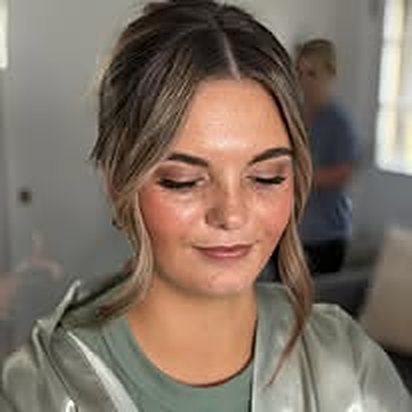 Client with soft bronzed eye makeup
